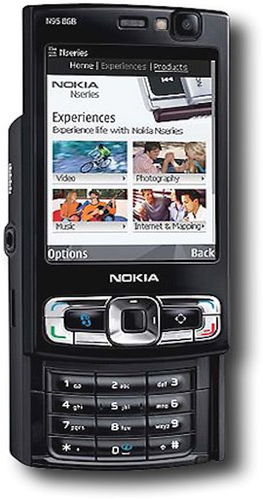 Front view of the black Nokia N95 slider phone with the numeric keypad exposed on the bottom portion, call and end buttons above the keypad, and the large 2.6" QVGA display filling the top portion.